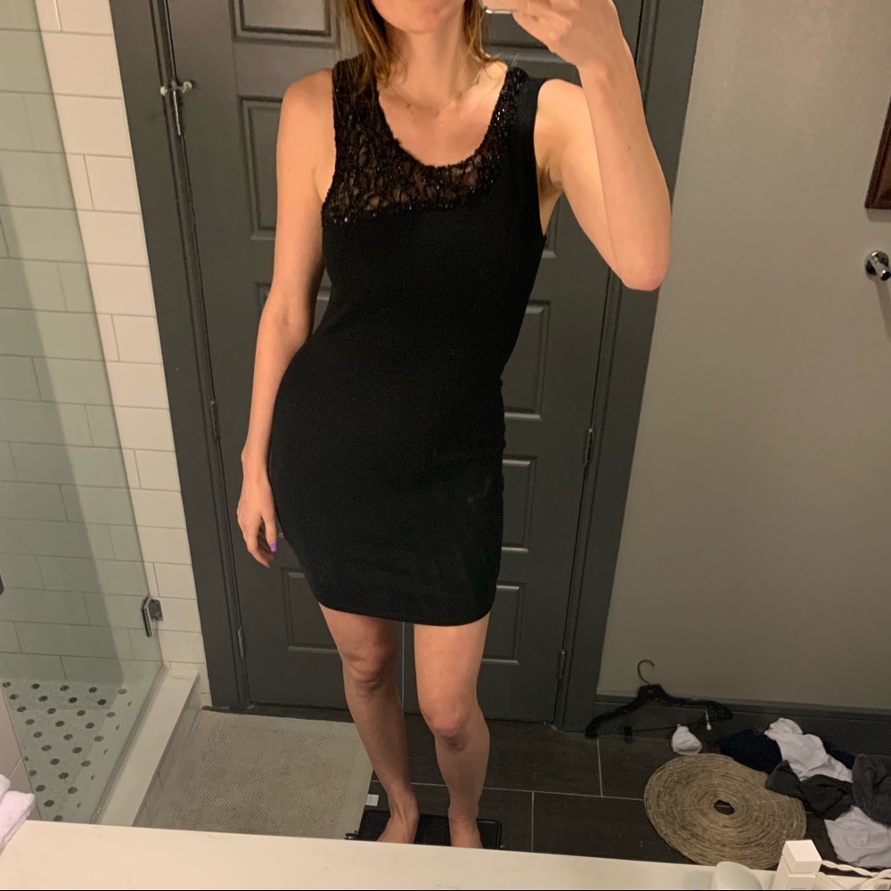 Black sequined body hugging dress